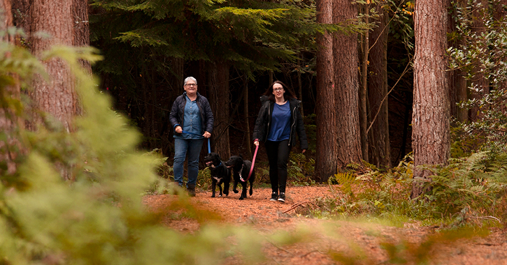 mum and daughter enjoying a dog walk in Hamsterley Forest